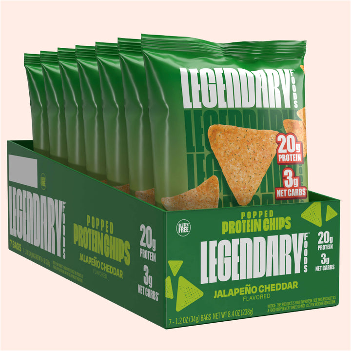 Box of Legendary Foods Jalapeño Cheddar Popped Protein Chips, showing multiple green bags with 20g protein and 3g net carbs branding.