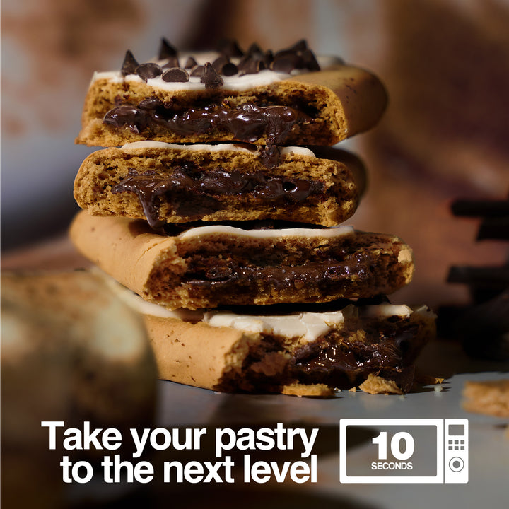 Stacked, melted s'mores protein pastries. Text: 'Take your pastry to the next level' with a microwave icon and '10 seconds.'